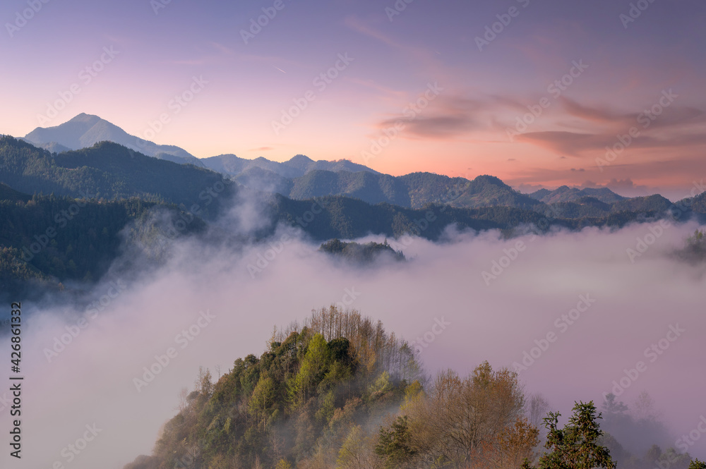 sea of clouds on mountains in sunrise
