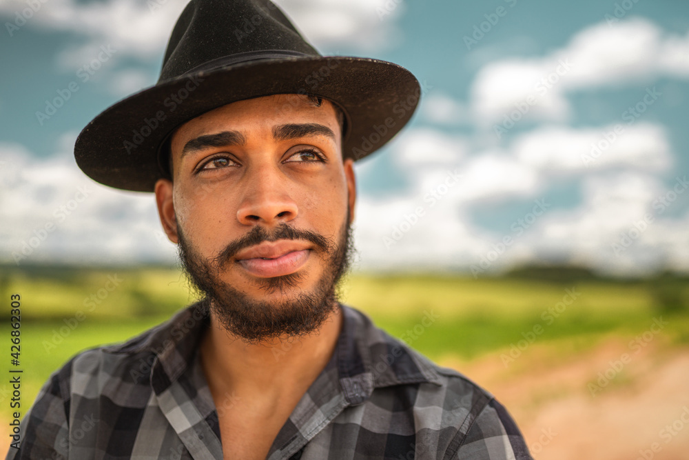 Close up Portrait of a proud Latin American farmer looking at right
