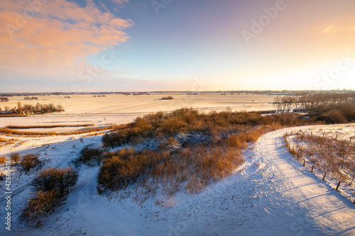 Wallpaper Mural Snowy landscape with hills and meadows in Buytenpark Zoetermeer, the Netherlands Torontodigital.ca