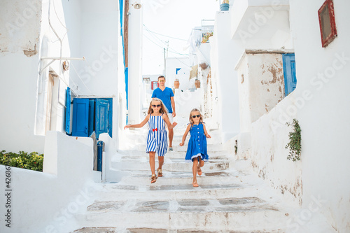 Family having fun outdoors on Mykonos island © travnikovstudio