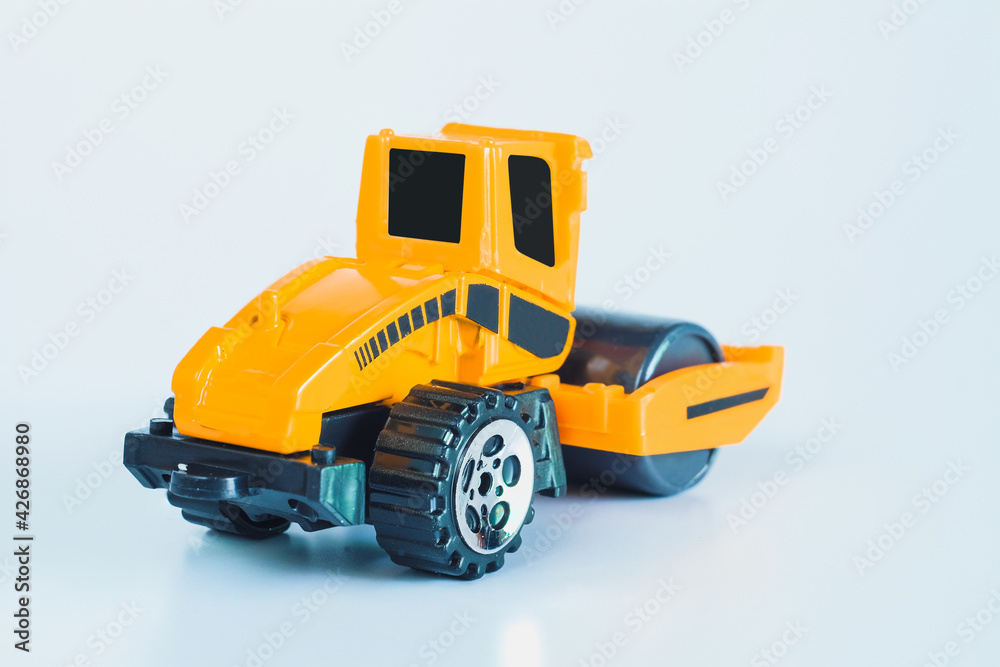 Construction vehicles and heavy machinery.Industrial vehicles yellow road roller. Construction vehicles and heavy machinery.Industrial vehicles yellow road roller.