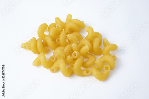 Group of cavatappi or cellentani pasta uncooked. Mac and cheese noodles.