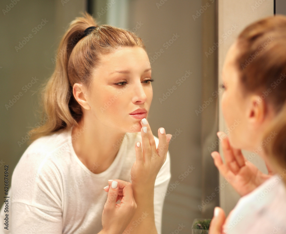 Magic anti-aging cream.Applying the cream. Magic anti-aging cream.Applying the cream.