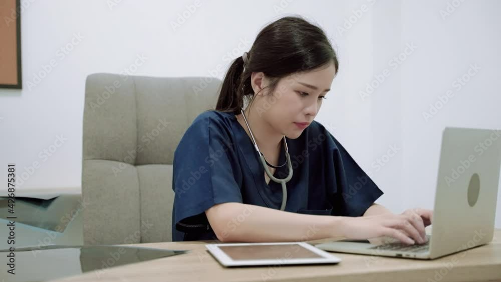 young Asian doctor walks into a office where she is stressed out of being a surgeon
young Asian doctor walks into a office where she is stressed out of being a surgeon