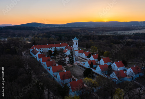 Majk, Hungary - The famous baroque Camaldolese monastery on a spring morning from drone point of view. Majk (or Majkpuszta) is a small village in the municipality of Oroszlány near Tatabánya. photo