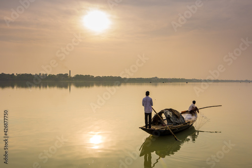 Fishermen on the river
