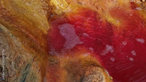 Reddish water at the source of the Rio Tinto in Huelva