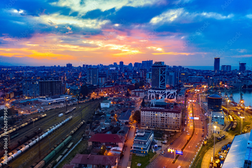 City lights on the background of a beautiful sunset