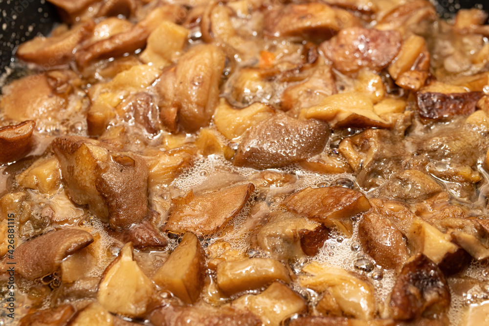 Braising slippery jacks in a pan Braising slippery jacks in a pan
