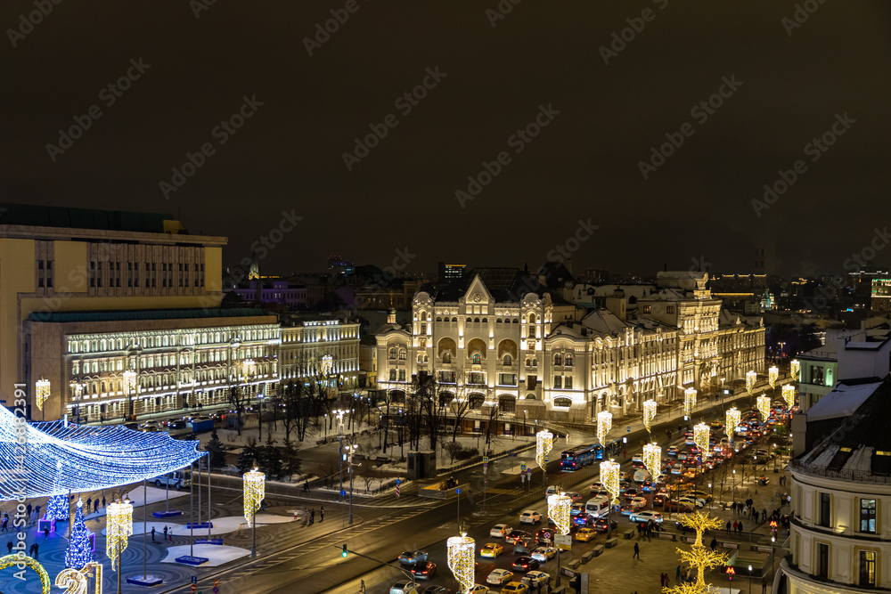 MOSCOW, RUSSIA - JANUARY 6, 2021: Aerial night view from rooftop viewpoint of the Central Children's Store on Lubyanka, legendary shopping mall located in the historical center in Lubyanskaya Square.