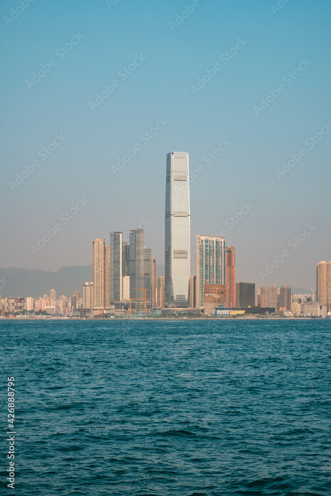 Modern skyscraper buildings in Kowloon Skyline, coast view and Hong Kong skyline