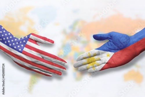 Philippines and USA - Flag handshake symbolizing partnership and cooperation with the United States of America
