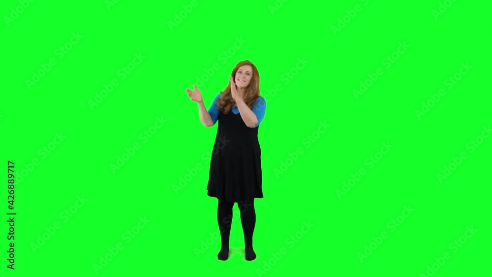 Teacher claps in front of a green screen Teacher claps in front of a green screen