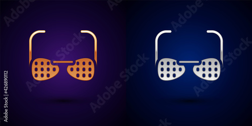 Gold and silver Glasses for the blind and visually impaired icon isolated on black background. Vector
