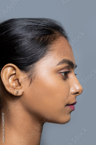 Beautiful profile of Indian beautiful young woman's side view,  photo