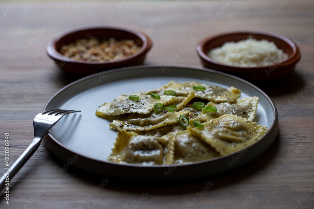 Mushroom ravioli with truffle butter, grated parmesan and hazelnut crumb
Mushroom ravioli with truffle butter, grated parmesan and hazelnut crumb