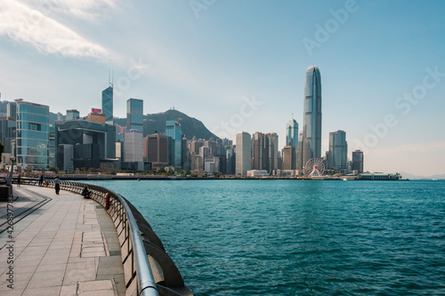 Waterfront Promenade with Victoria Harbour and skyline of Hong kong Island photo