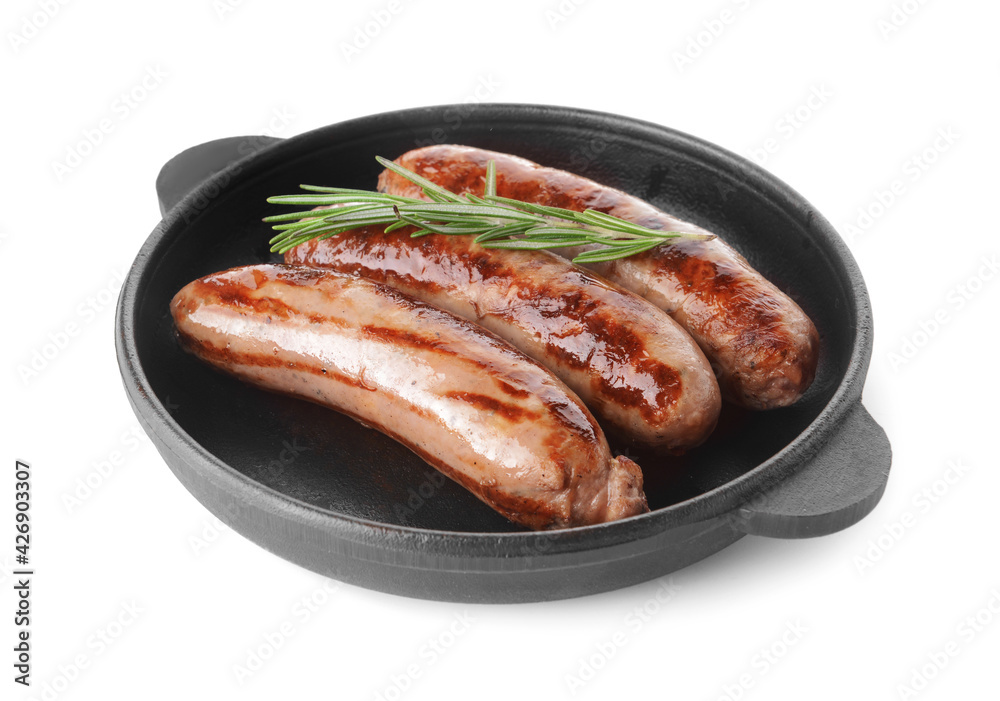 Frying pan with delicious grilled sausages on white background Frying pan with delicious grilled sausages on white background