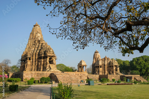 The Kandariya Mahadev Temple and the Devi Jagadamba Temple in Khajuraho, Madhya Pradesh, India. Forms part of the Khajuraho Group of Monuments, a UNESCO World Heritage Site. photo