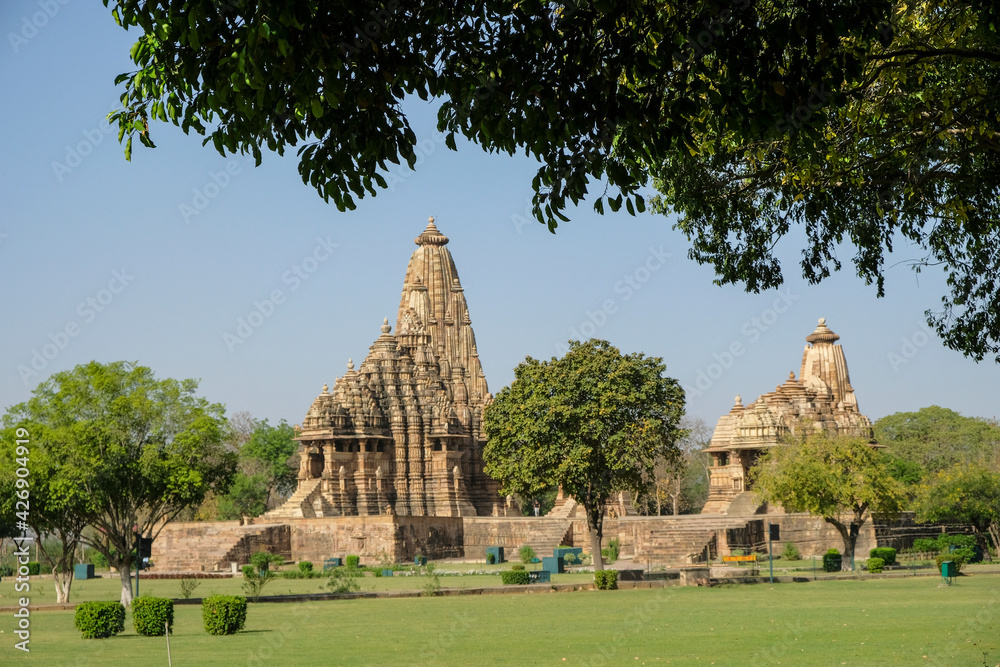 The Kandariya Mahadev Temple and Devi Jagadamba in Khajuraho, Madhya Pradesh, India. Forms part of the Khajuraho Group of Monuments, a UNESCO World Heritage Site.