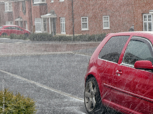 Fototapeta Naklejka Na Ścianę i Meble -  Hailstones in a suburban street