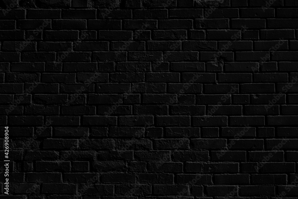 Obraz premium Black brick building wall. Interior of a modern loft. Background for design