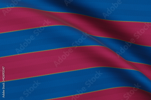 Flag of Barcelona waving on the wind. The colors of the Barcelona Sports Club 