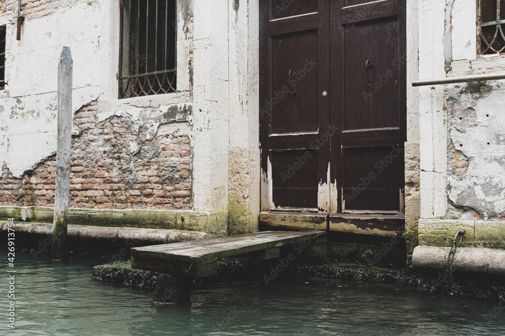 Doorway to a canal of Venice. Doorway to a canal of Venice.