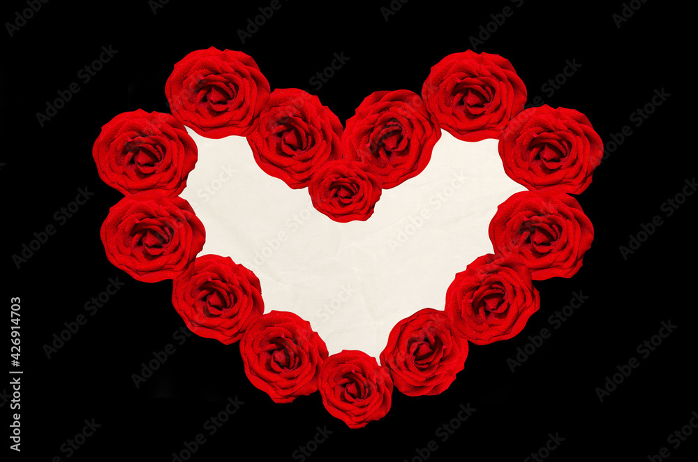 Heart-shaped frame of red roses for text on a black background Heart-shaped frame of red roses for text on a black background