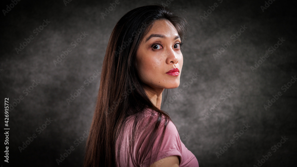 Young pretty woman in profile - portrait shot - studio photography Young pretty woman in profile - portrait shot - studio photography