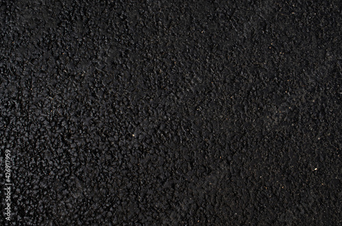 Black texture, asphalt Surface grunge rough of bitumen, tarmac dark grey grainy road, Driveway background