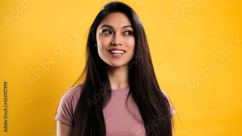 close up a confident happy woman - studio photography © 4kclips