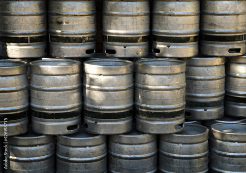 silver barrels of beer, in distillery, brewery
