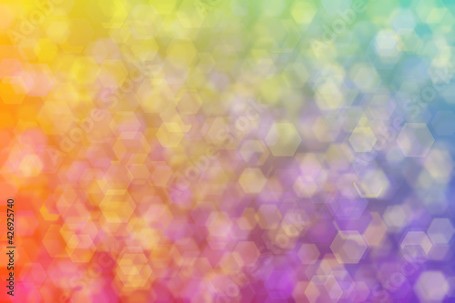 Abstract background with gradient from yellow to purple and different mixtures.