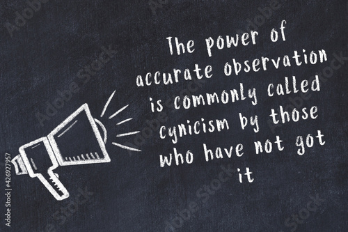 Canvas Print Chalk sketch of loudspeaker on black desk and movitational quote