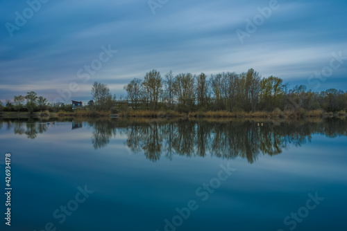 Panoramic landscape with the fishing lake near Ketsch in Germany.