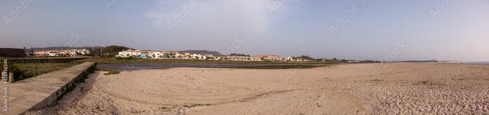 Panoramic view of the marginal riverside, along the mouth of the Cavado River in Esposende, Portugal.