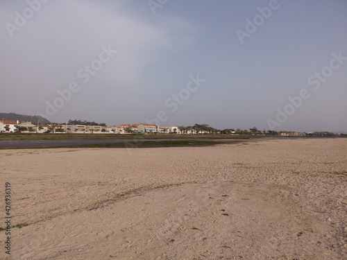 The marginal riverside, along the mouth of the Cavado River in Esposende, Portugal. photo