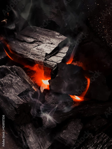 Burning logs - black and red photography