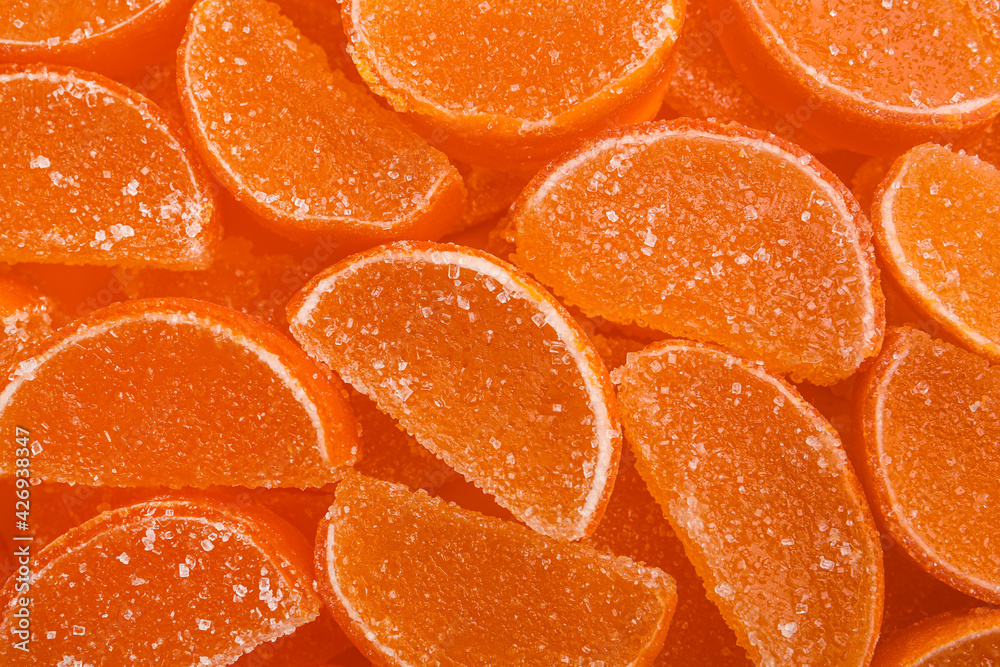 Sweet orange marmalade as background, top view Sweet orange marmalade as background, top view