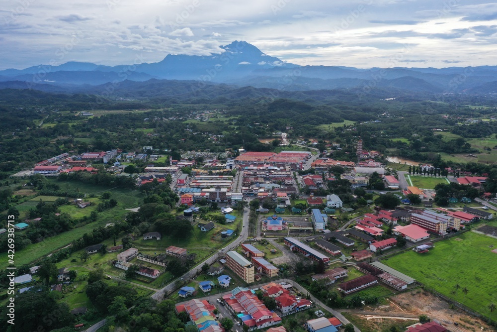 aerial view of tuaran town with mount kinabalu on background