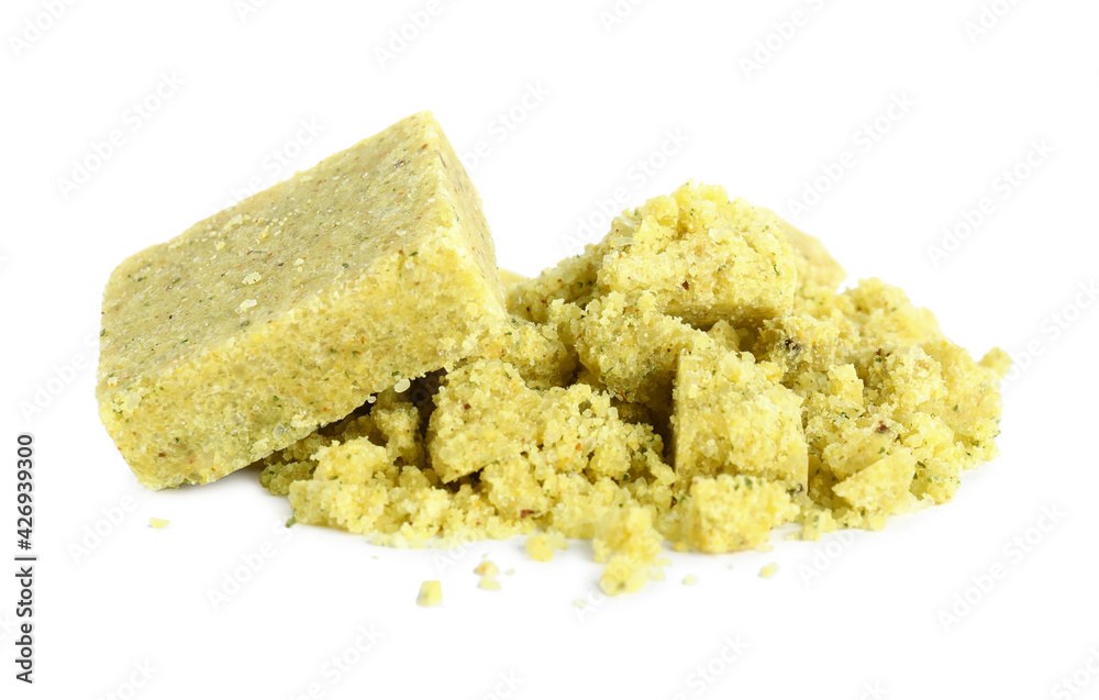 Aromatic crumbled and whole bouillon cubes on white background Aromatic crumbled and whole bouillon cubes on white background