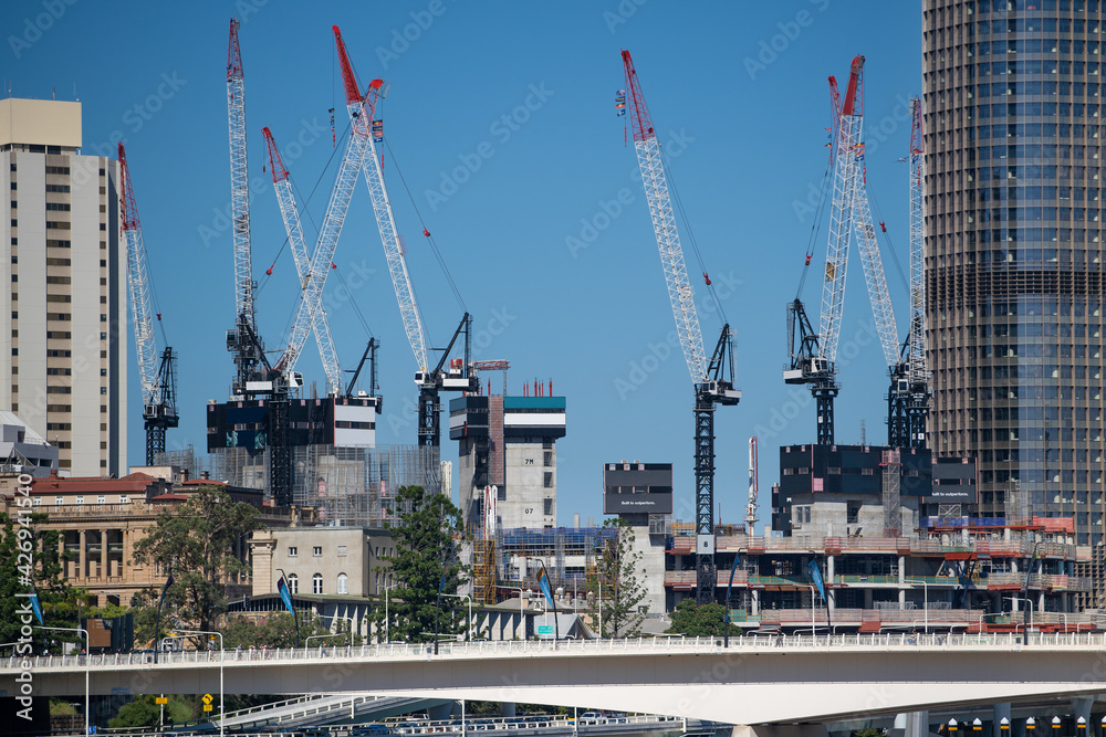 Cranes reach into the sky as construction under way in the heart of Brisbane. April 2021