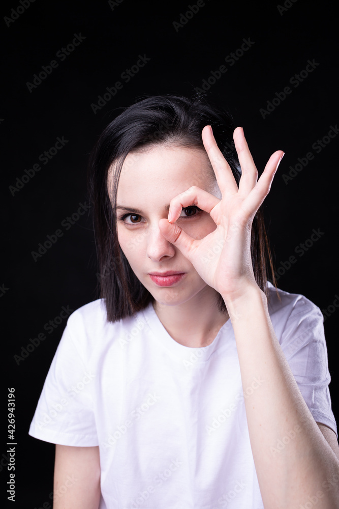 woman in white clothes on black background