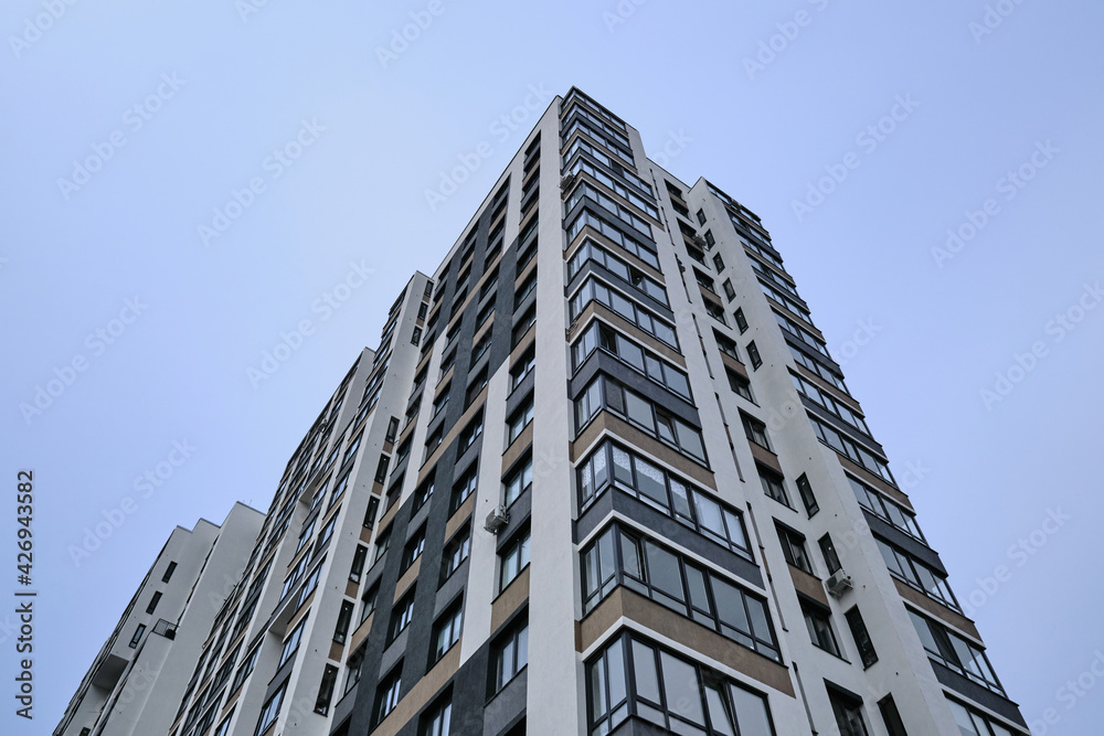 High-rise residential building against the sky. Elite area