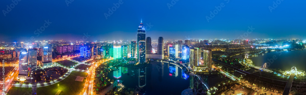 Obraz premium Aerial photography of the night view of Didang Lake Central Business District, Shaoxing, Zhejiang
