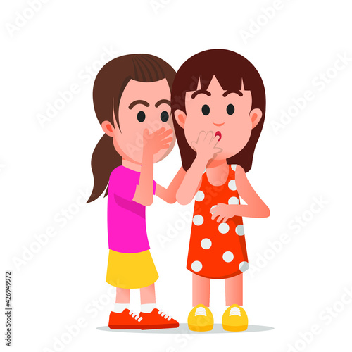 Little girl whispered something to her friend
