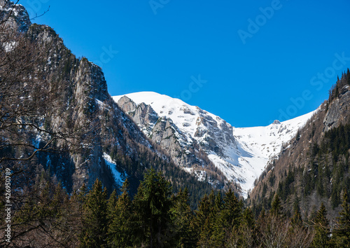 Obraz na płótnie Bucegi mountain massif with snow as part of Carpathian mountains in Romania in winter w salonie