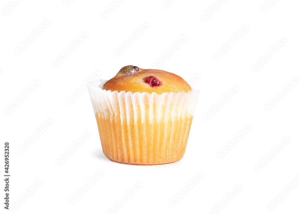 Fruit berry muffin or cupcake. Delicious small baked muffin with berries and muffin liner. Isolated on white. Fruit berry muffin or cupcake. Delicious small baked muffin with berries and muffin liner. Isolated on white.