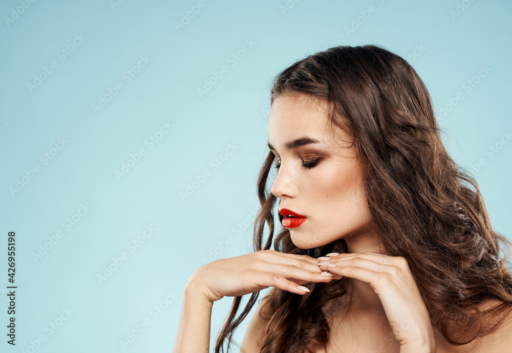 Obraz premium Beautiful brunette red lips bared shoulders sexy woman model